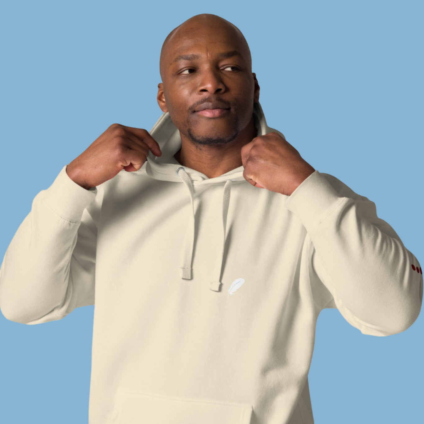 Man wearing a beige hoodie