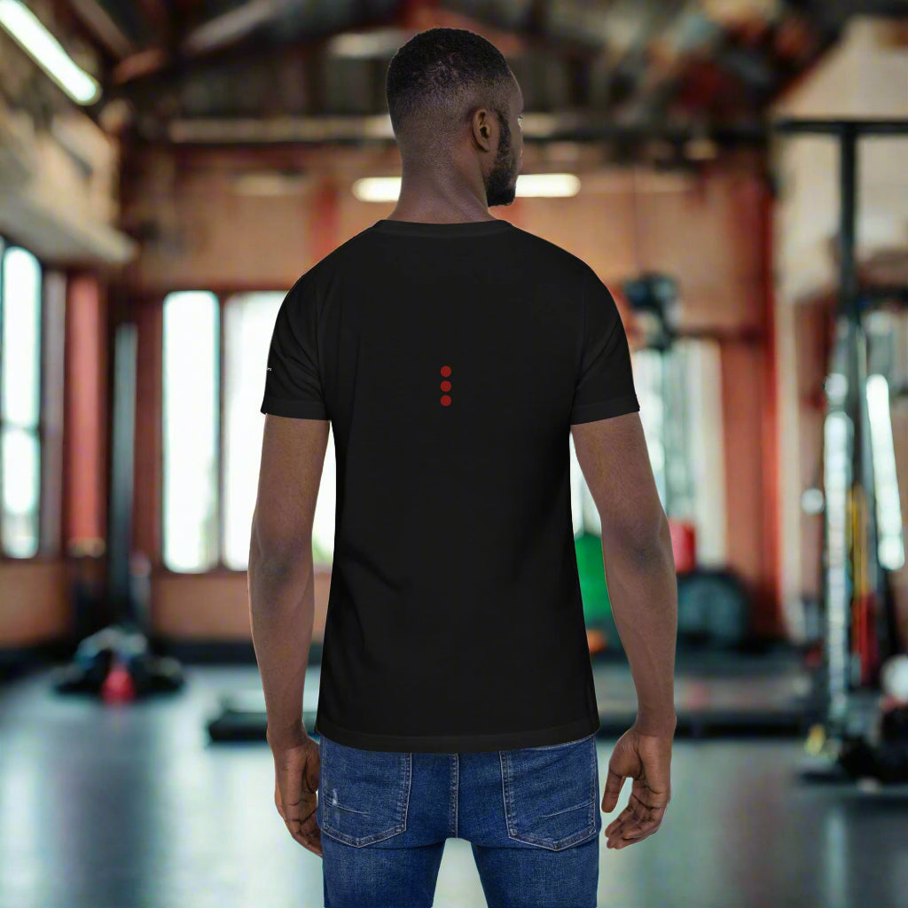 Person wearing a black t-shirt with a red logo on the back.